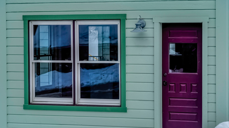 Green house exterior purple door