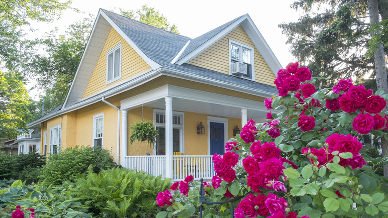 Yellow and white house exterior