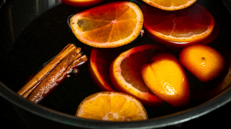 Simmer pot filled with herbs, fruit, and oils