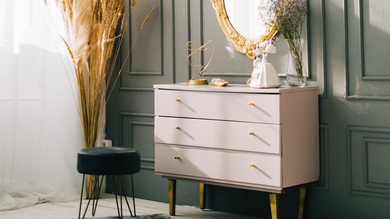 dresser surrounded by decor