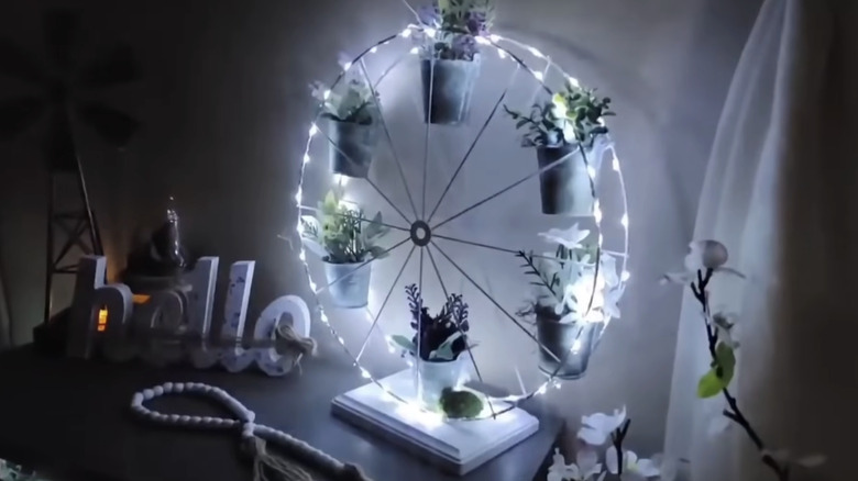 Ferris wheel table decor with fairy lights.