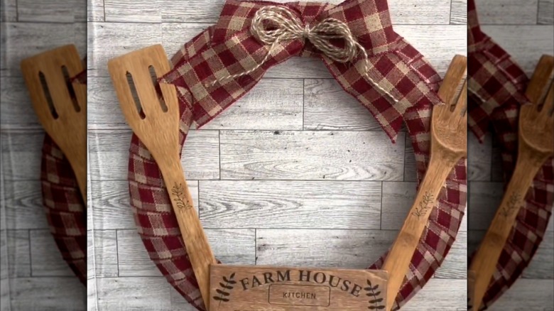 The top of a decorative wreath with gingham ribbon.