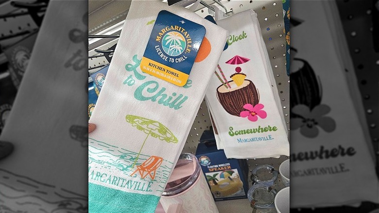 Two Margaritaville hand towels on the shelf at Dollar General