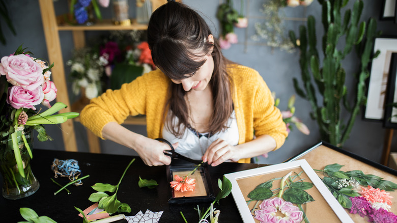 person diying flower art