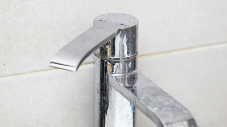 Close up of stains on faucet