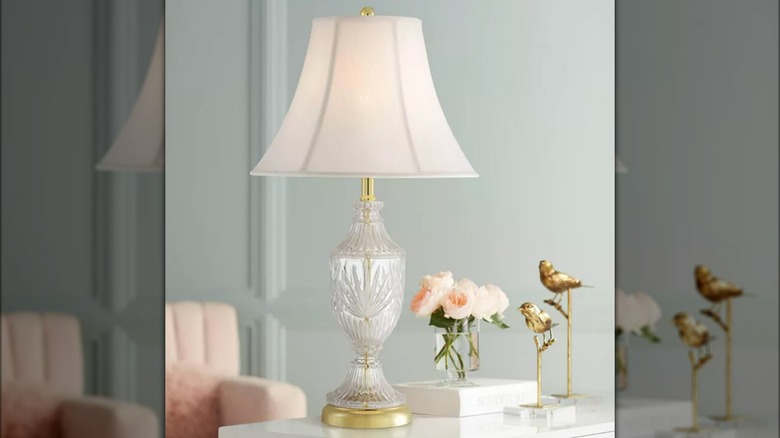 Glass lamp on side table