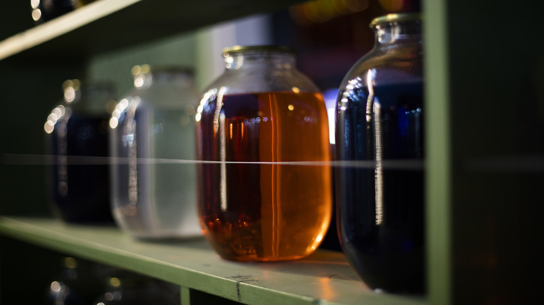 Jars filled with colorful liquid chemicals