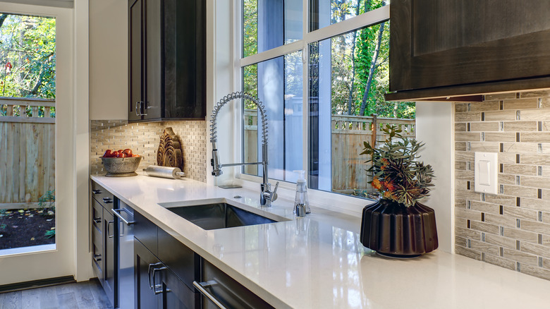 Kitchen with glass mosaic backsplash