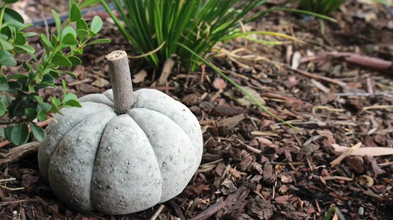 A papercrete pumpkin in the garden.