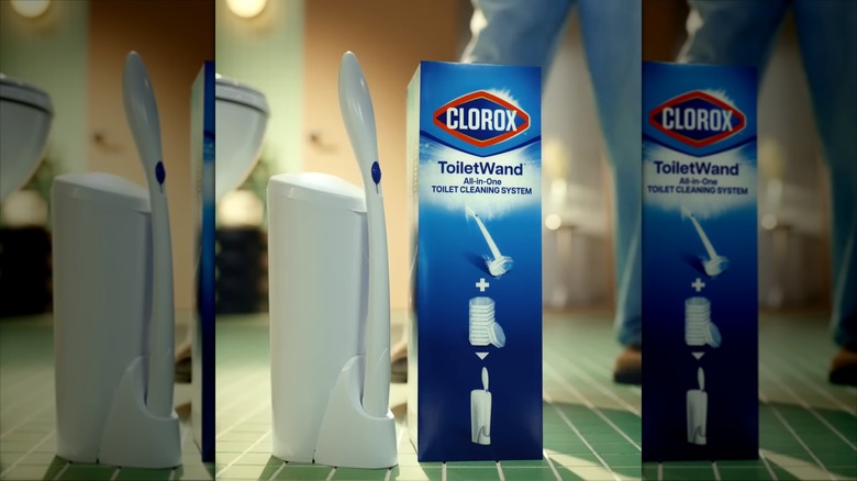 Clorox ToiletWand System next to the box on a tiled bathroom floor