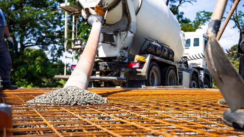 Concrete mixer pouring concrete at a building site