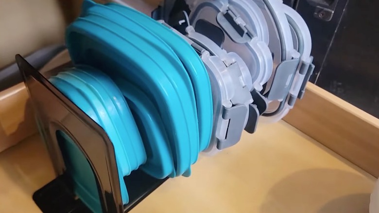 Container lids neat and organized using bookends