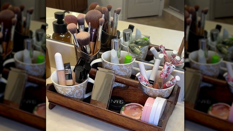 Vintage thrift store finds put together to make a countertop storage station.