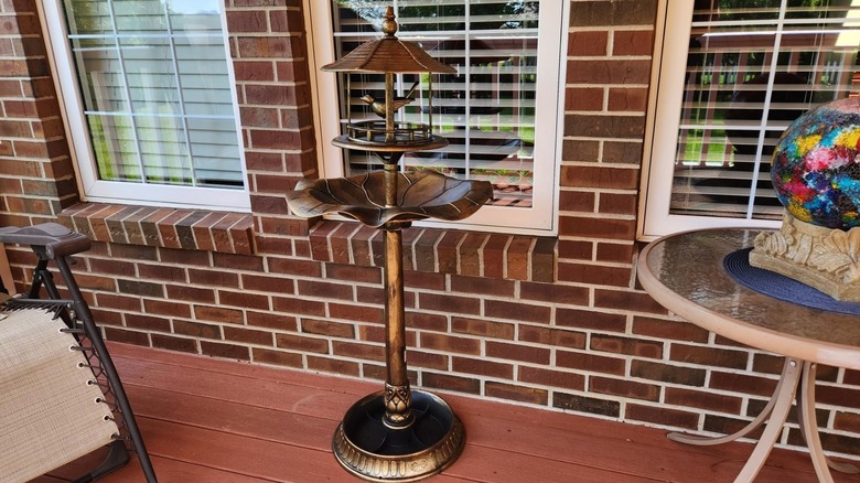 The Outsunny 3-in-1 bird bath bowl focused on the upper levels
