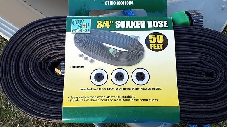 A close up of the One Stop Gardens flat soaker hose still in its packaging