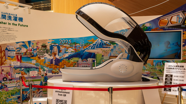 Black and white human-sized pod for bathing in.