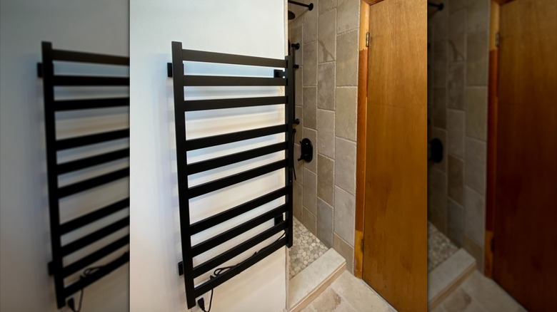 Towel warming bar in a bathroom