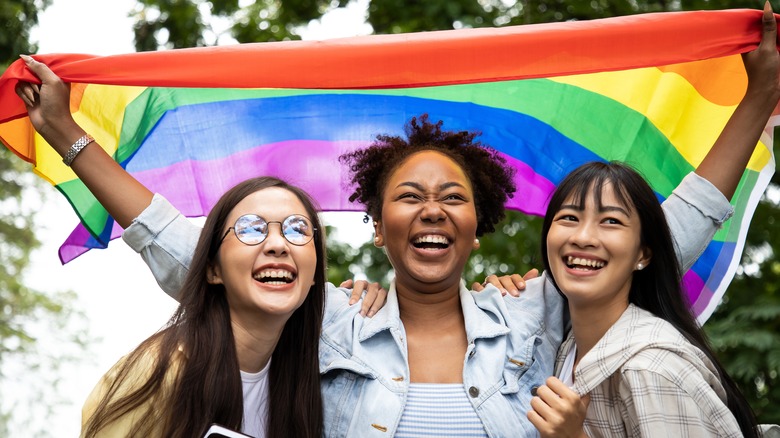 group with pride flag