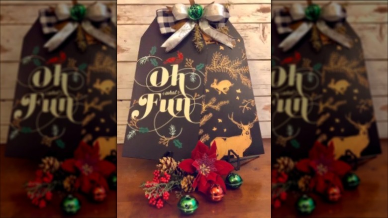 Oversized tags with festive decor