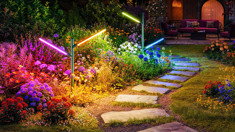 Govee outdoor garden lights creating a colorful ambiance along a garden walkway