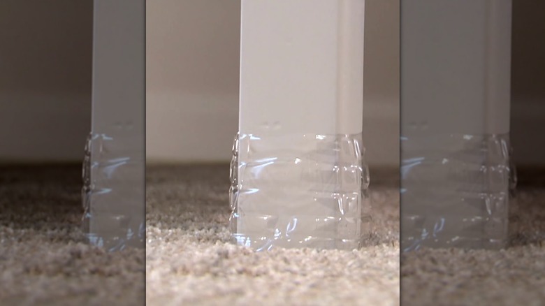 Furniture leg with a plastic bottle slider
