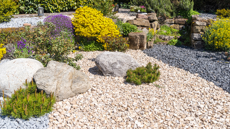 A landscaped area with colorful crushed rock
