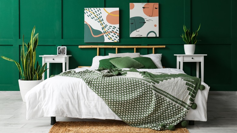Bedroom with emerald green walls