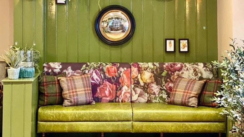 Sap Green on wall in front of sofa