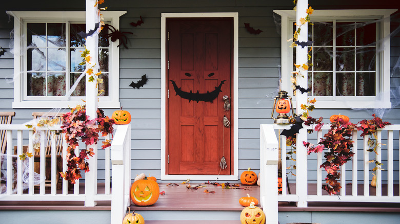 front door decorated for halloween