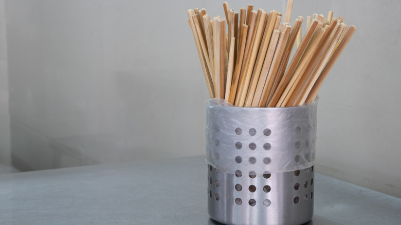chopsticks in stainless steel container