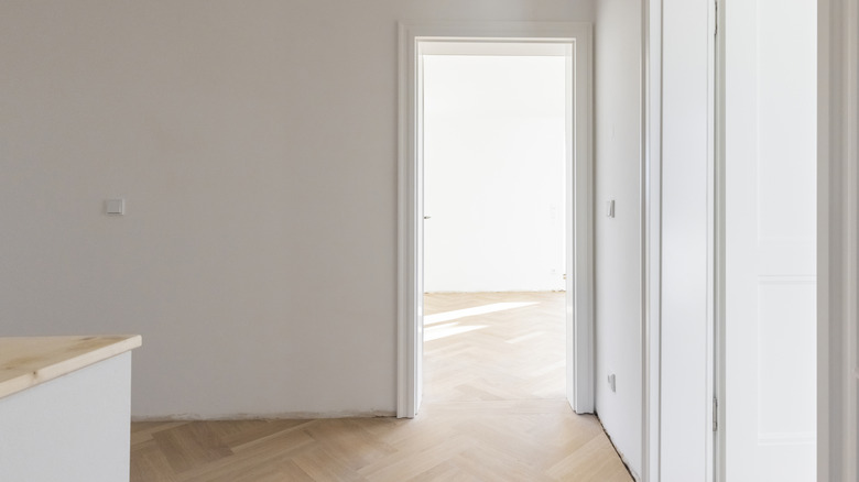 An plain white door frame in an empty home or apartment