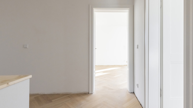 An plain white door frame in an empty home or apartment