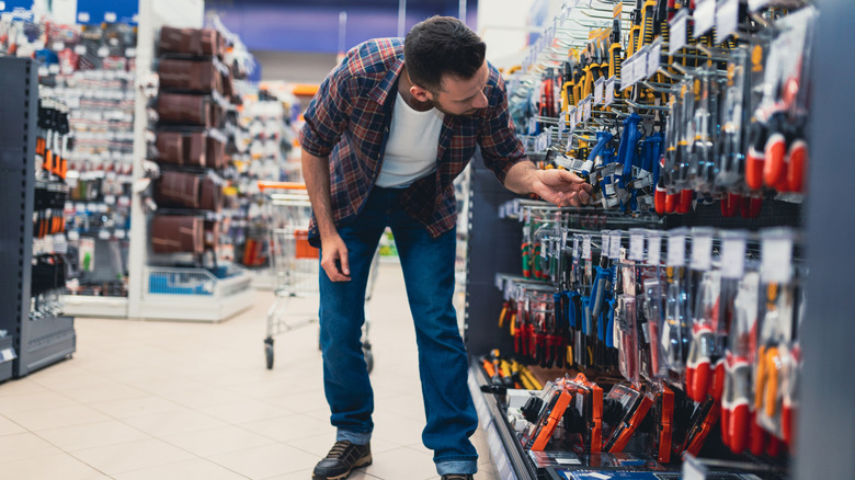 A person shopping at a hardware store