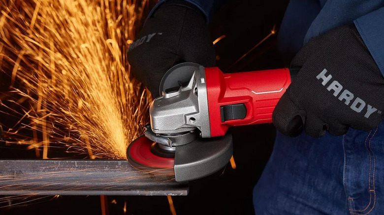 Bauer's 7-Amp Slide-Switch Angle Grinder in use, with sparks flying