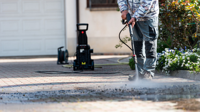 Cleaning with pressure washer