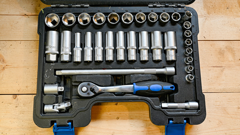 A set of sockets in a tool box.