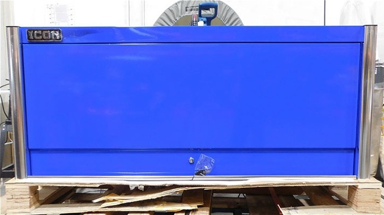 Blue ICON tool storage chest from Harbor Freight with a noticeable scratch and dent in the corner