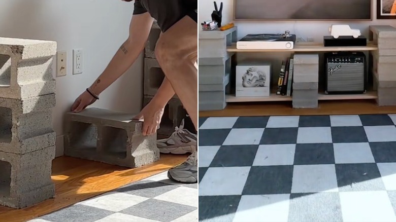 A DIY TV stand made from concrete blocks and wooden planks.
