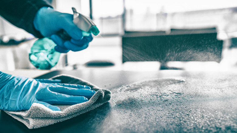 spray cleaning a counter