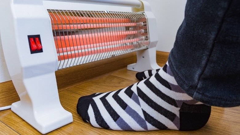 Electric space heater on floor 