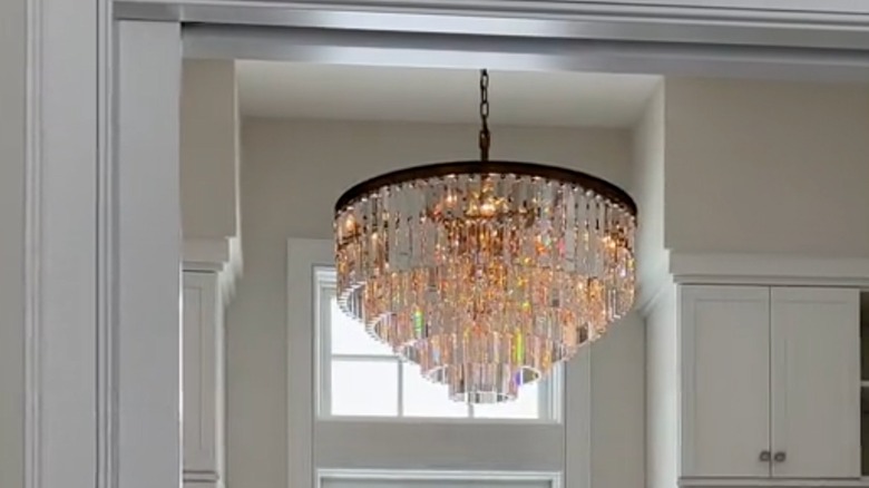 Crystal chandelier hanging in a closet