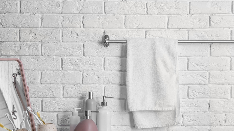 Hand towel rack in bathroom