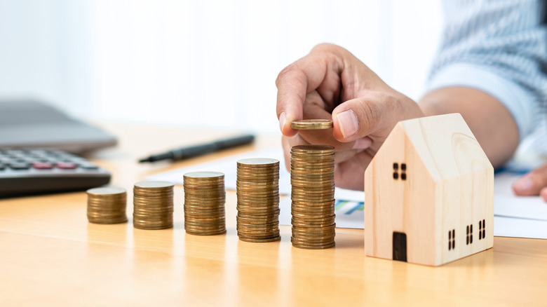 Stacked coins near home model