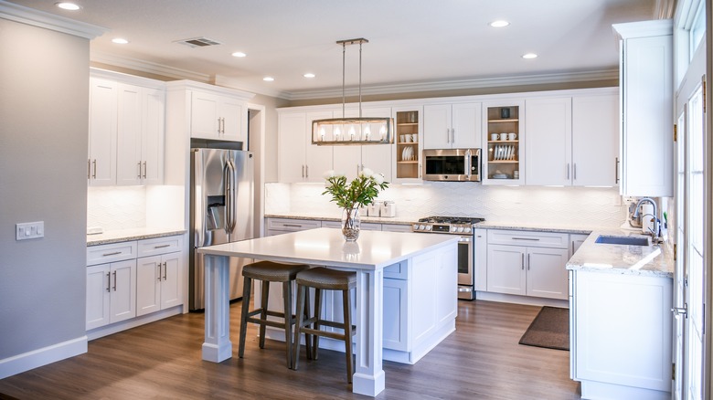 brightly lit white kitchen