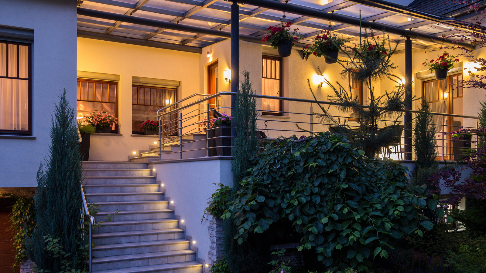 Here's How Much It Costs To Light Up Your Porch