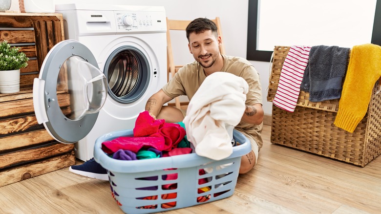 Man sorting laundry