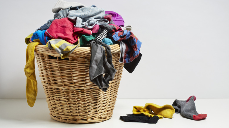 Wicker hamper and dirty laundry