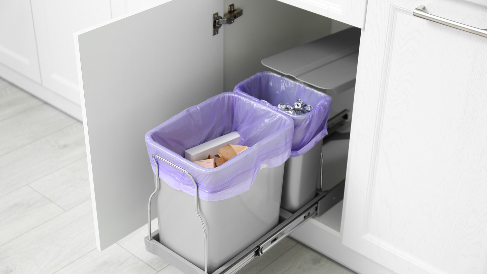 https://www.housedigest.com/img/gallery/heres-how-often-you-need-to-clean-your-garbage-can/l-intro-1646858514.jpg