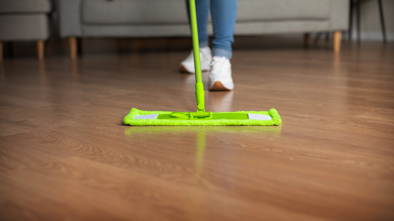 https://www.housedigest.com/img/gallery/heres-how-often-you-should-be-cleaning-your-vinyl-plank-flooring/intro-1699387303.jpg