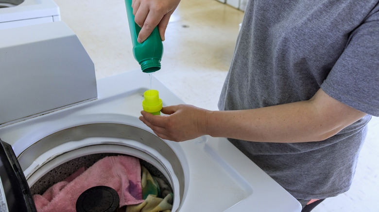 Person laundering towels